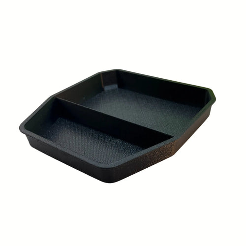 Land Rover Defender armrest storage tray installed in console — Rigid Custom Works