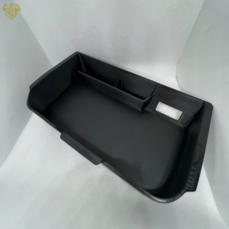 Nissan Xterra armrest console tray installed in center console — Rigid Custom Works