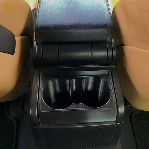 Rear view of installed BMW ER6 cup holder in black finish