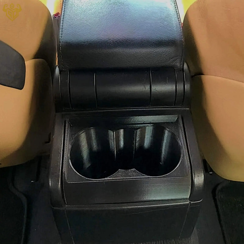 Rear view of installed BMW ER6 cup holder in black finish