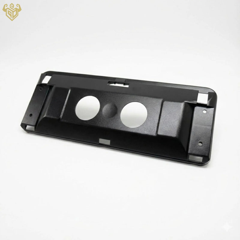 The backing plate being snapped into place on a Mercedes sun visor.