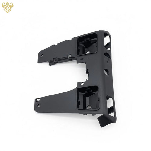 Detailed view of the reinforced mounting clips on the Rigid Custom Works Mercedes R129 dome light housing.
