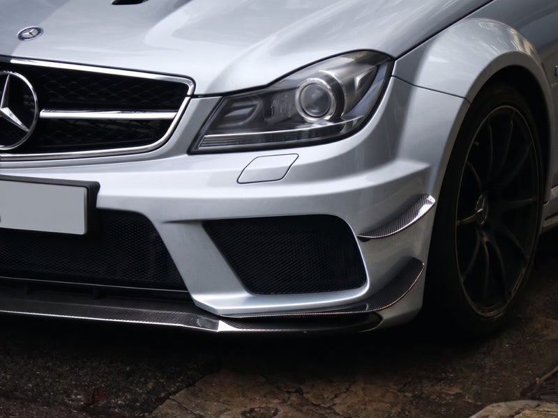 Carbon fibre front bumper canards fitted on a Mercedes W204 C63 AMG Black Series
