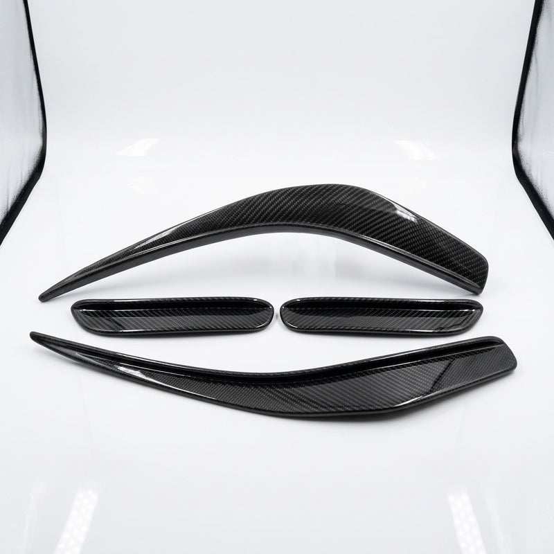 Matched set of 4 carbon fibre canards for Mercedes W204 C63 AMG, studio view