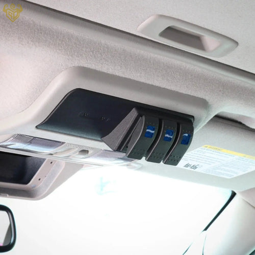Nissan Frontier overhead 3-switch panel close-up detail — Rigid Custom Works