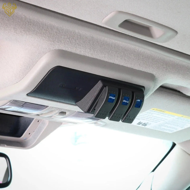 Nissan Frontier overhead 3-switch panel close-up detail — Rigid Custom Works