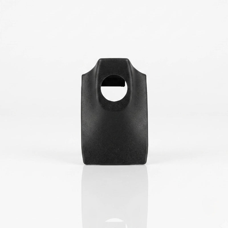 Top-down view of black Mercedes R129 A124 rear view mirror dome light cover showing lens aperture — RCW part 1298110071