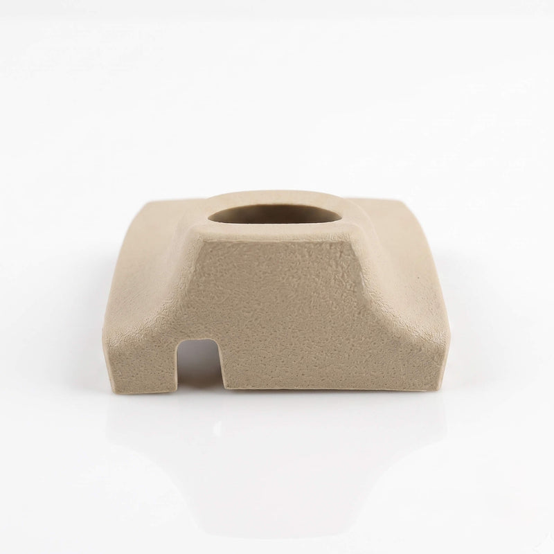 Top-down view of beige Mercedes R129 A124 rear view mirror dome light cover showing lens aperture — RCW part A1298110071