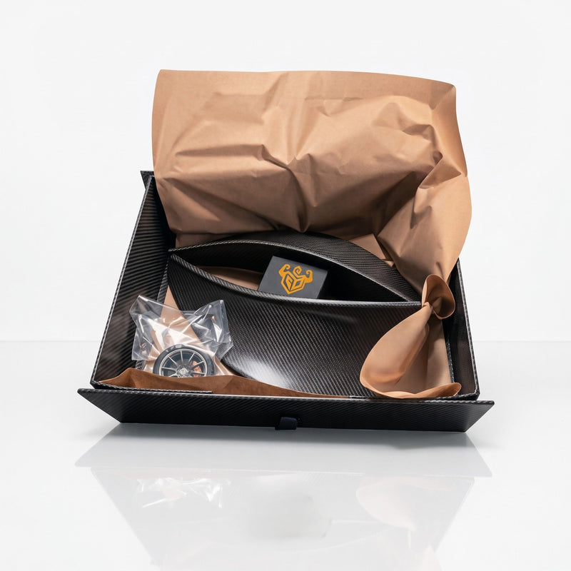 SLR McLaren 722 carbon rear spoiler set packed in Rigid Custom Works packaging with mounting hardware